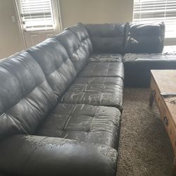 Large Leather Couch Scratched. 