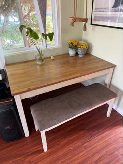 Two-tone wood dining table with bench
