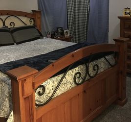 Solid Wood With Rod Iron Queen Bedframe. (OBO)