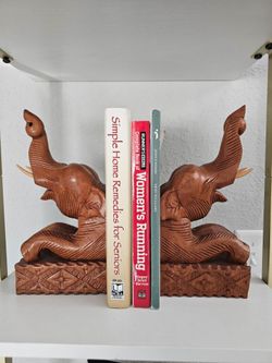 vintage hand carved wooden elephants.
