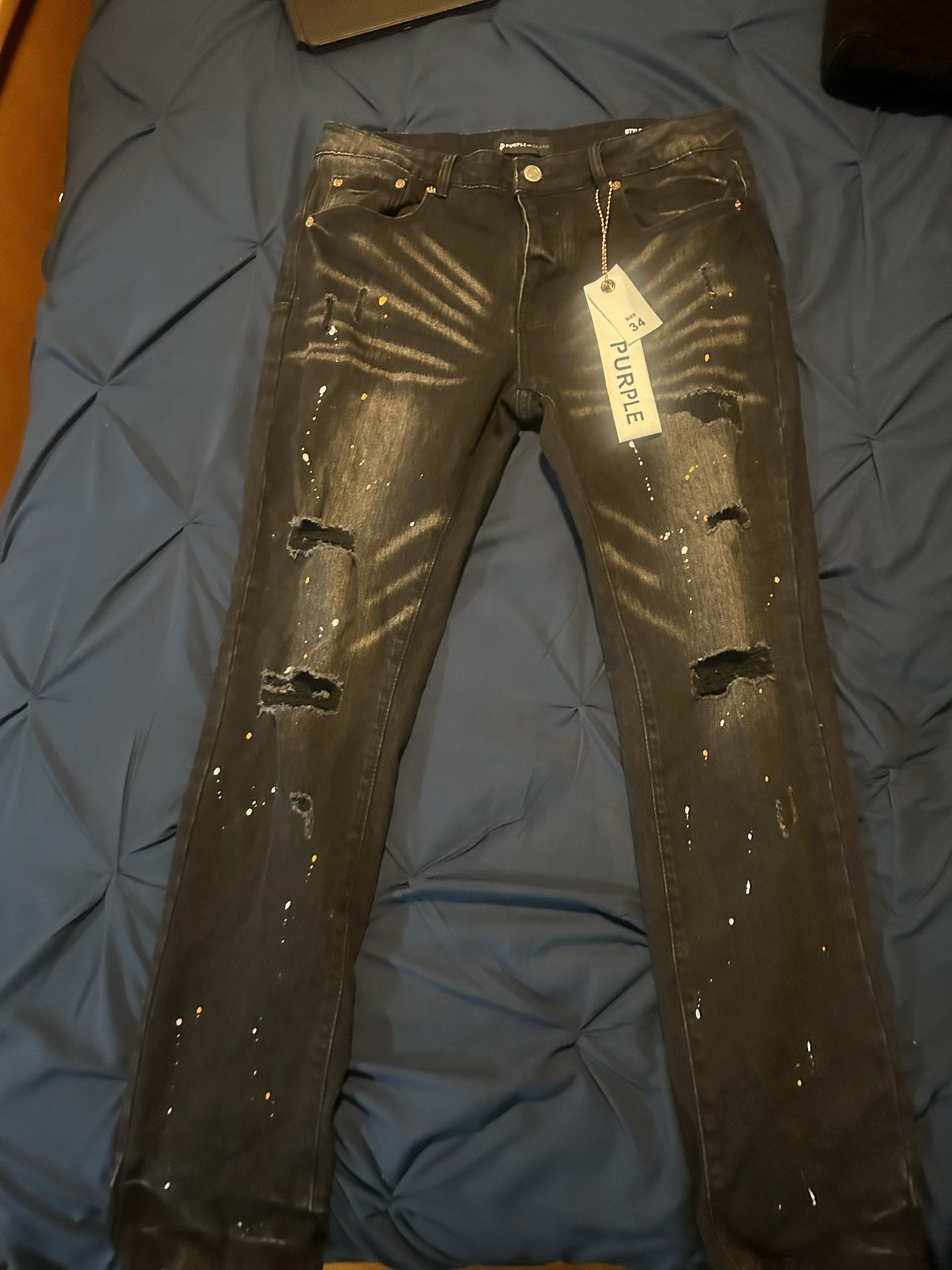 purple jeans size 34