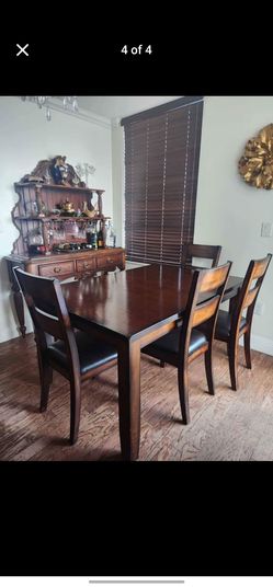 Dining table with 4 chairs and  bunch from Eldorado