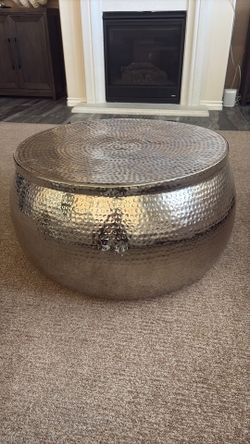 Storage round coffee table, silver hammered
