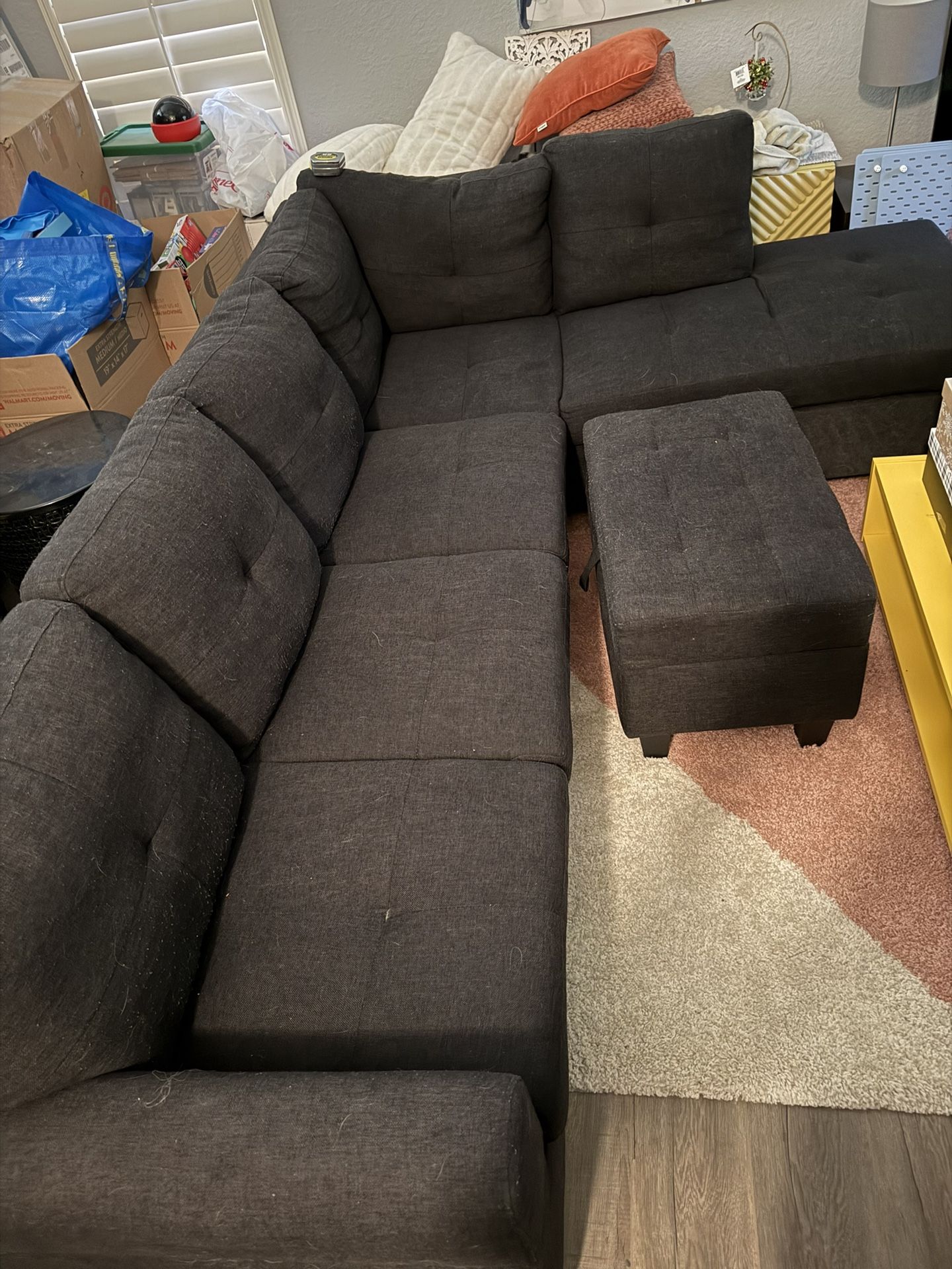 Black sectional Couch With Ottoman