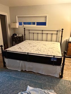 King size Pottery Barn iron bed with mattress and box