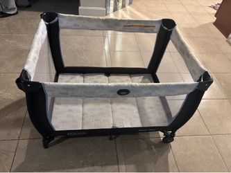 Graco Pack ‘ n  Play portable player.