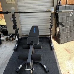 Weight Bench and Barbell 