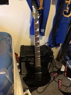 Left handed guitar with amp