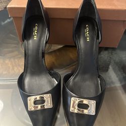 black and gold coach heels