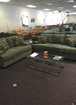 Grey Serta sofa and loveseat