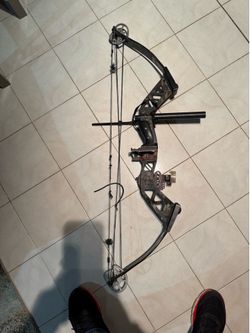 vintage PSE compound bow with a "G-FORCE"