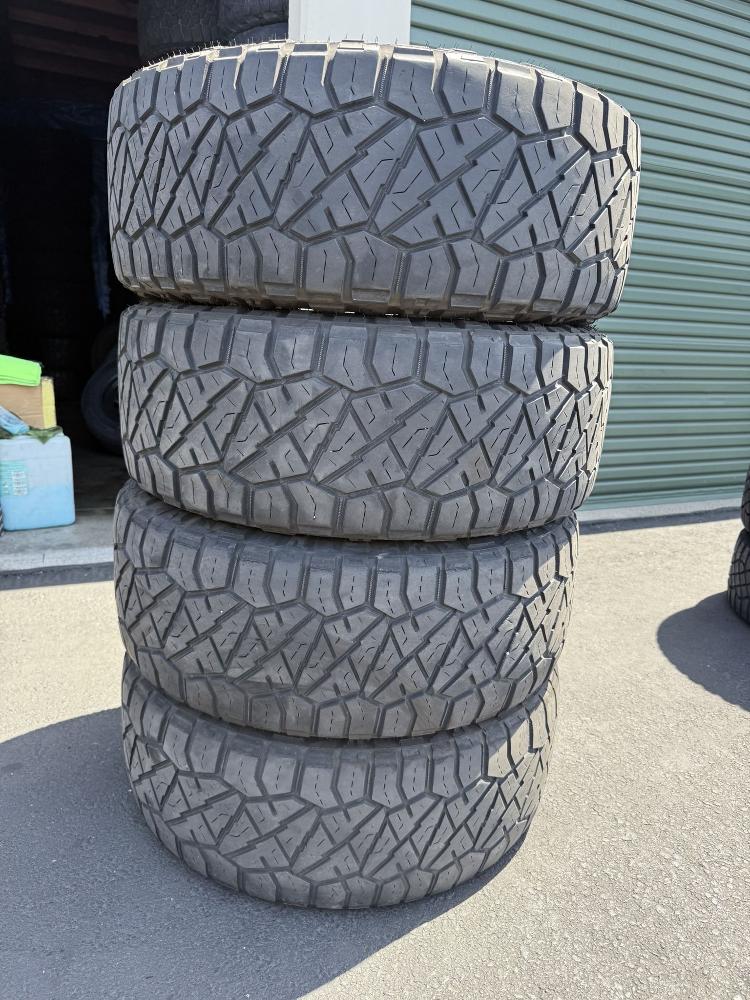 (4) 295/60R20 Nitto Ridge Grappler