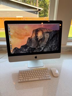 Apple iMac 21.5” + Keyboard & Mouse