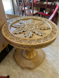 Round Wood Pedestal Table with Carved Detail