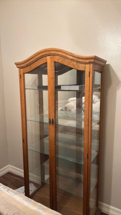 Curio with glass shelves