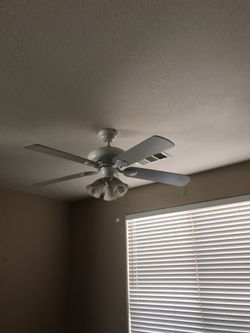 5 fans one white light fixture and valance