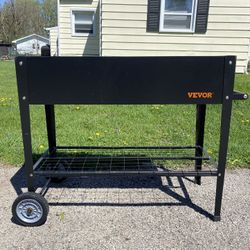 Used Vevor raised metal plant box/bed on legs and wheels