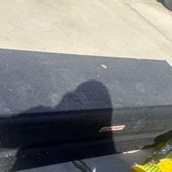 It's a tool chest for a back of a truck. Standard truck width