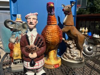 4 liquor decanters 1960’s-70’s