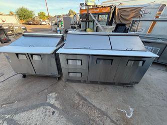 True and Everest refrigerated prep tables in perfect condition; they are like new, very clean, and maintain the correct temperature—essential for your