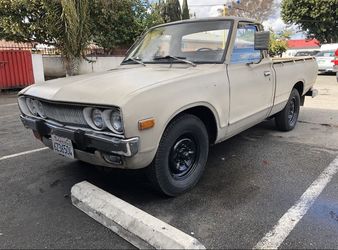 1974 Datsun Truck  Registered  Clean title Rebuilt engine  Runs xlnt  Needs to be restored
