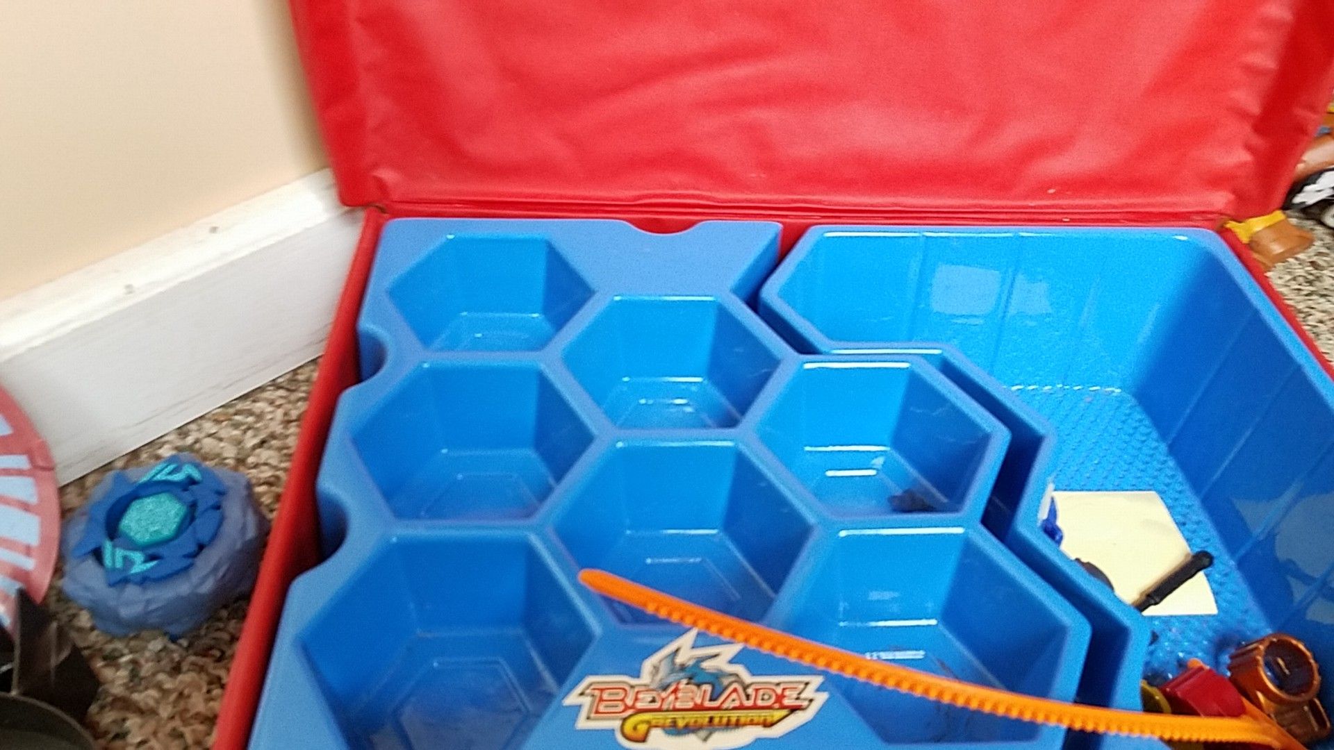 Beyblades and arena sets