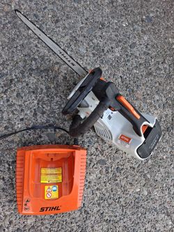 STIHL 36Volt Chainsaw MSA161T. AP300 Bat AL300 Charger. Good Con( crack in bottom in pic) pick up fremont sea. No lowball offers please. No trades