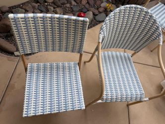 2 Patio Arm Chairs and 4 Armless chairs in a very good condition