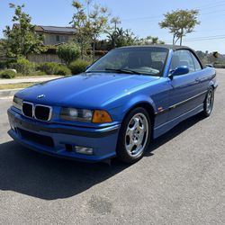 For Sale 1999 BMW E36 M3 Automatic Estoril Blue 2 door convertible in great condition !