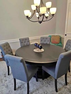 Round dining room table and chairs