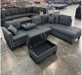 Brand new sectional with storage ottoman