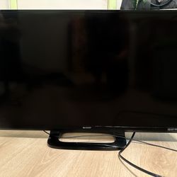 Flatscreen Tv 32” WITH FIRESTICK