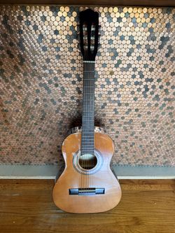 Starter guitar with hard case.
