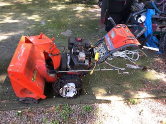 Snow blower project. Strong engine. Needs carb clean. Drive stopped working. Electric start. $899 new.