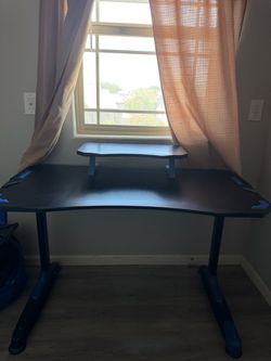 Black desk with monitor stand 47in