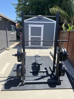 NEW- Deluxe Gym set up- Includes everything in picture- Squat stand, Bench, bar, bumper plates  (Example picture) 