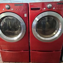 LG Front Loading Washer And Stackable Gas Dryer Set With Pedestals 