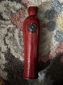 Approximately 14 inches tall  decorative vase .