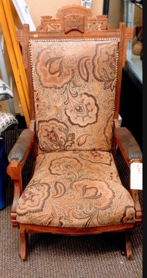 Carved Wood Platform Rocker Rocking Chair. Item features Rolling casters, solid wood frame,  nicely carved details, very nice antique item.