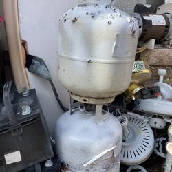2 propane tanks one has gas. The other is empty good for exchange at Walmart $10 each.