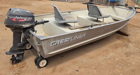Crestliner boat and Johnson 6.0 HP motor