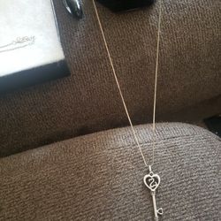 Kay Jewelers jane Seymour sterling Silver Key Pendant With Diamonds and silver chain.