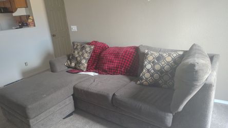 Sectional couch with ottoman