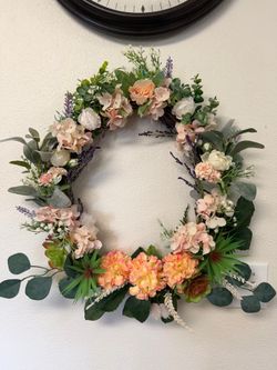 Pretty Handmade Oval 17x19 Faux Flower/Plant Wreath.  Please see my others items for sale.