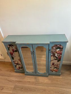 Cabinet with Floral Panel Doors