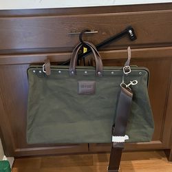 Line of trade Olive Canvas Duffel with Brown Leather Trim and Detachable Strap