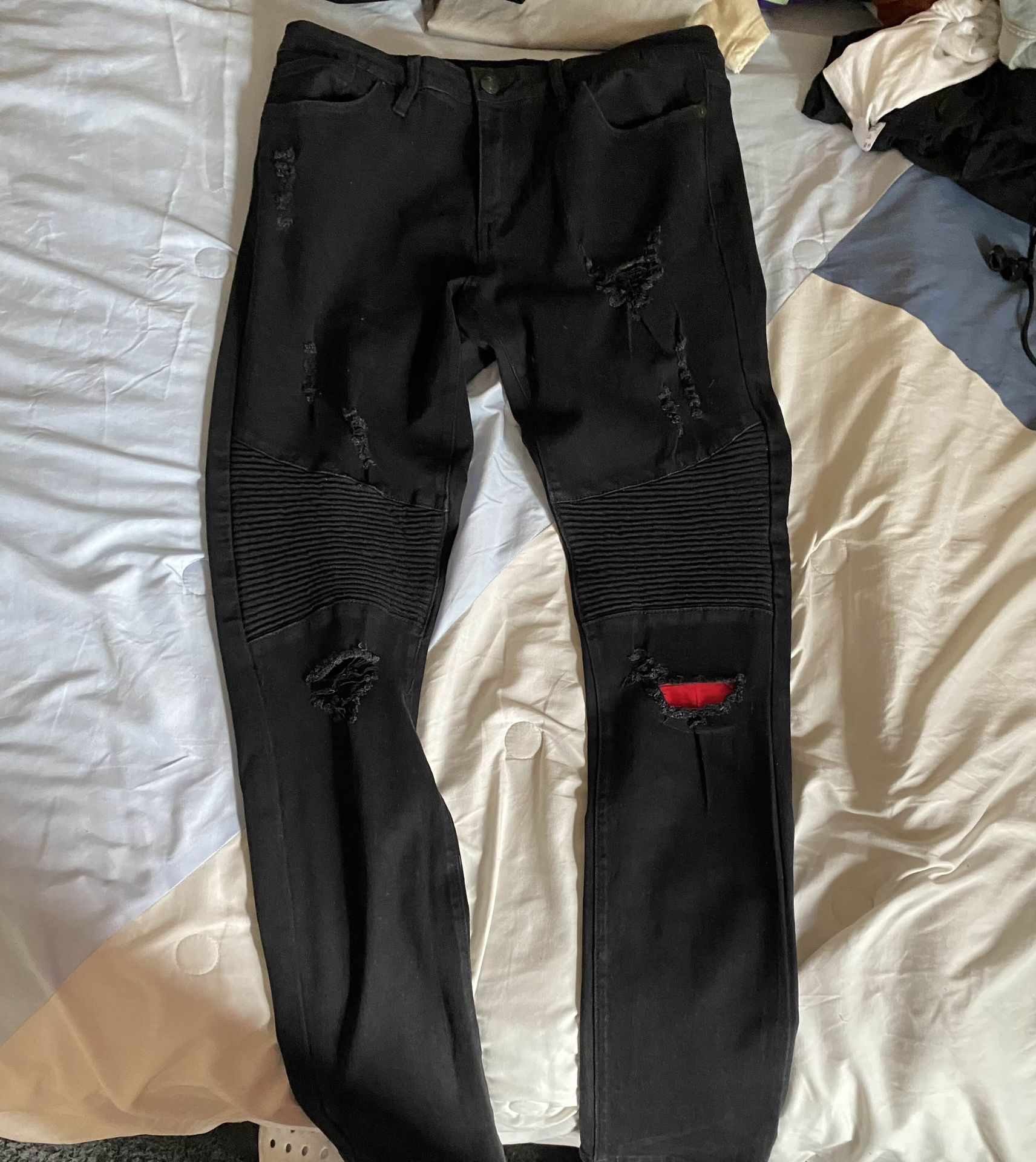 Black And Red Stacked Jeans