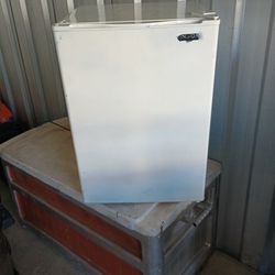Insignia Small Refrigerator With Glass Shelves.