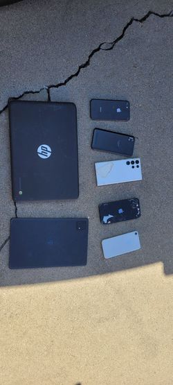 Several Phones And Laptop