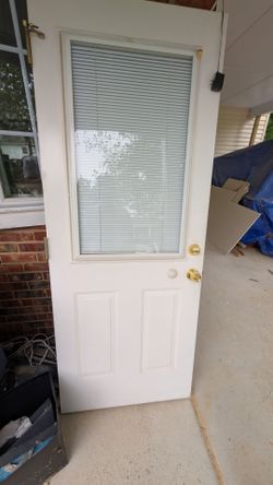 White Exterior Entry Door w/ Built-In Glass Blinds